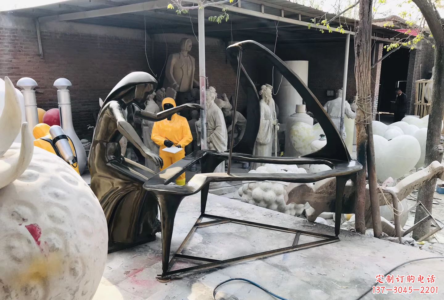 绵阳抽象弹钢琴人物雕塑