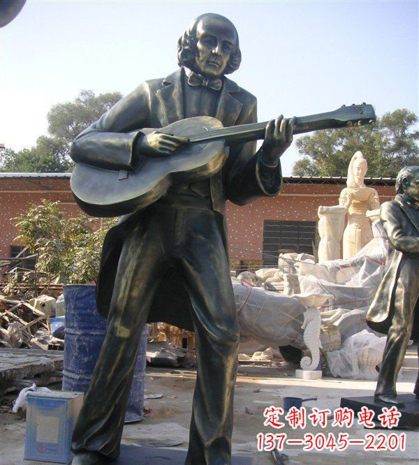 绵阳公园弹吉他的西方男人人物铜雕