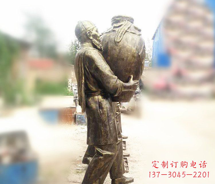 绵阳广场铜雕店小二抱酒人物雕塑