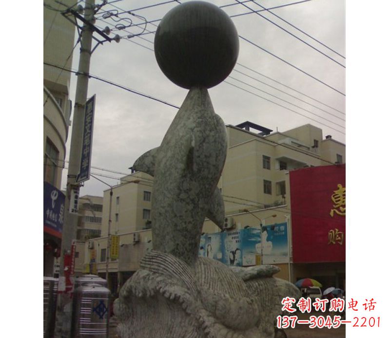 绵阳海豚戏球石雕
