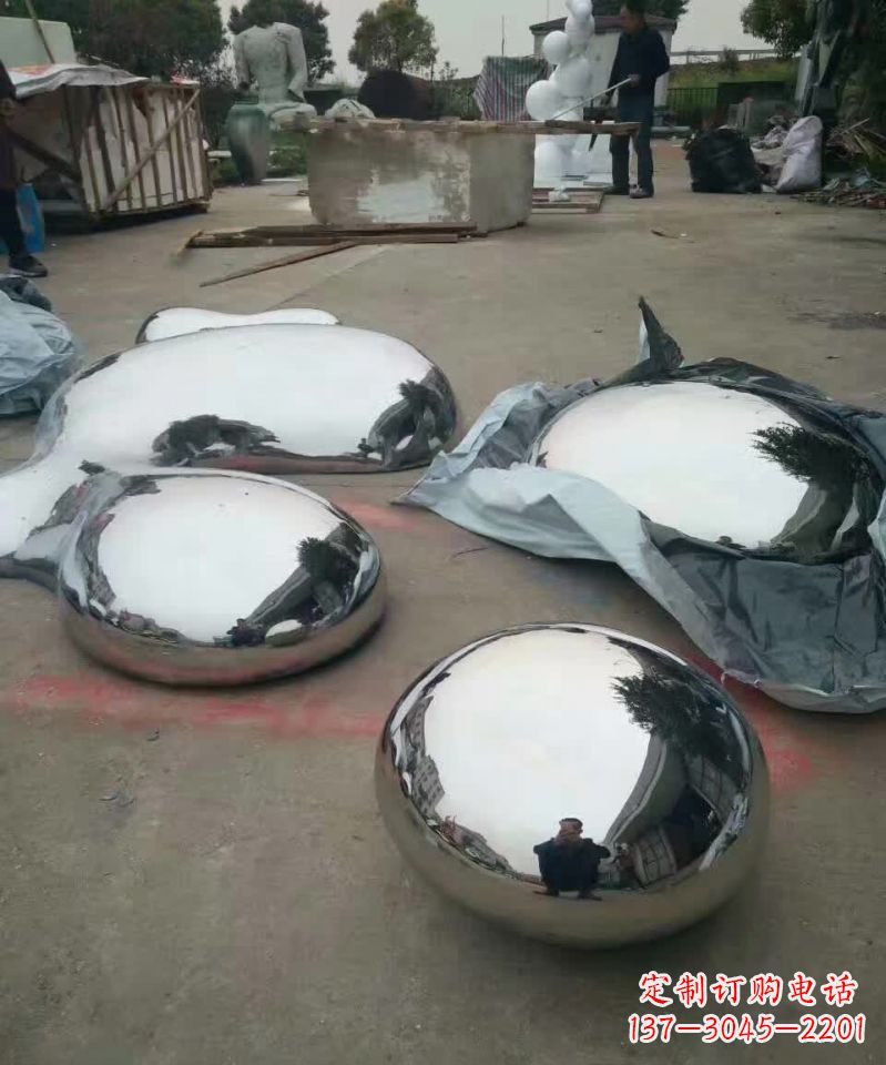 绵阳镜面不锈钢水滴座椅雕塑