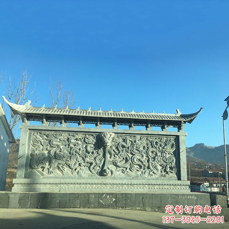 绵阳青石九龙壁,精美雕塑饰衬城市广场