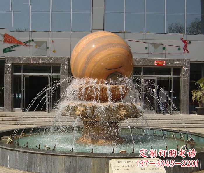 绵阳石来运转球晚霞红风水球石雕