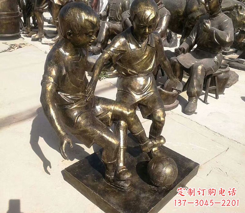绵阳踢足球的儿童铜雕