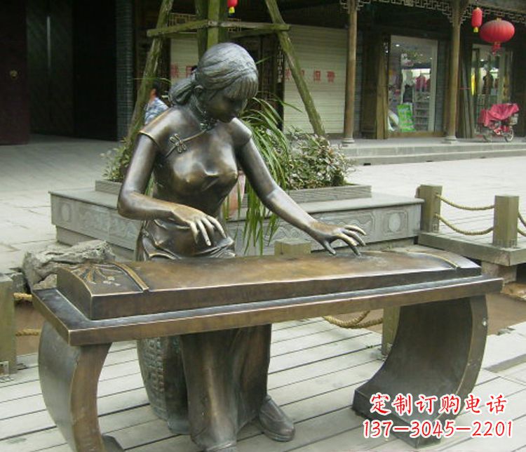 绵阳铜雕现代人物弹古筝雕塑
