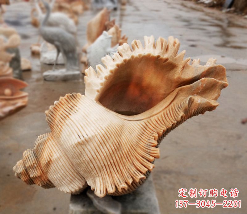 绵阳晚霞红海螺石雕广场景观雕塑