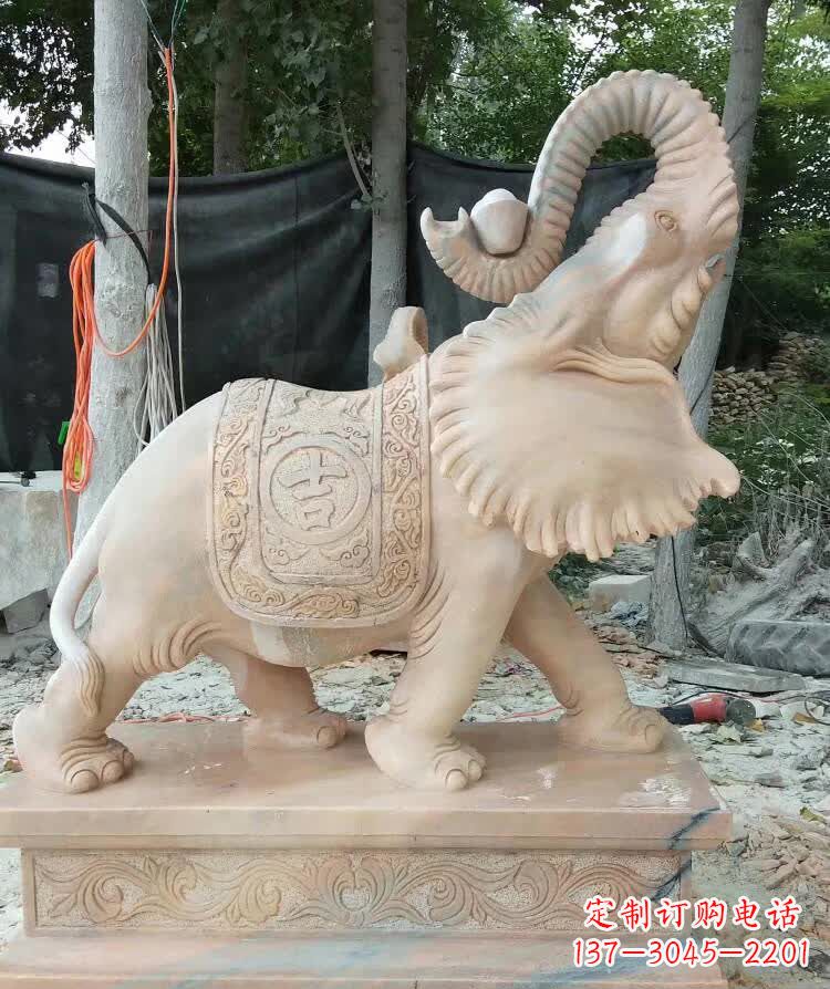 绵阳晚霞红卷元宝大象雕塑