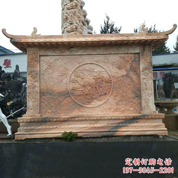 绵阳晚霞红麒麟影壁墙石雕