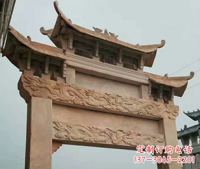 绵阳晚霞红石雕单门牌坊
