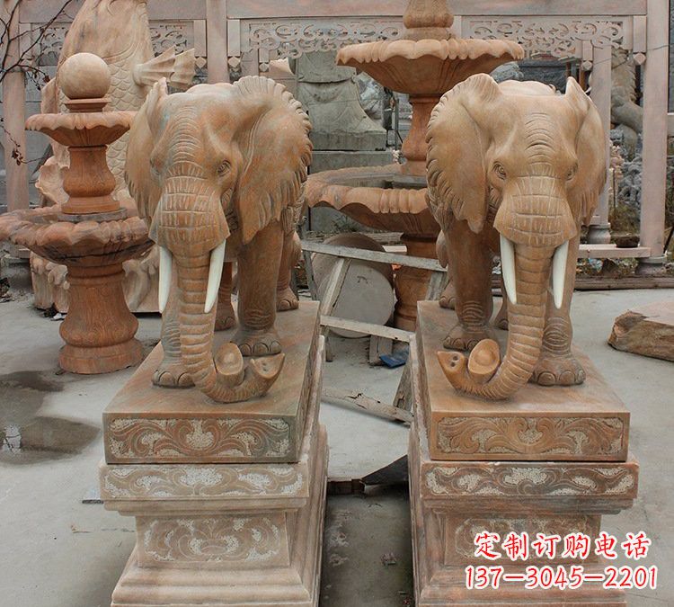 绵阳晚霞红石雕元宝大象