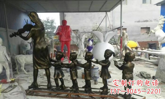 绵阳校园老师和儿童铜雕