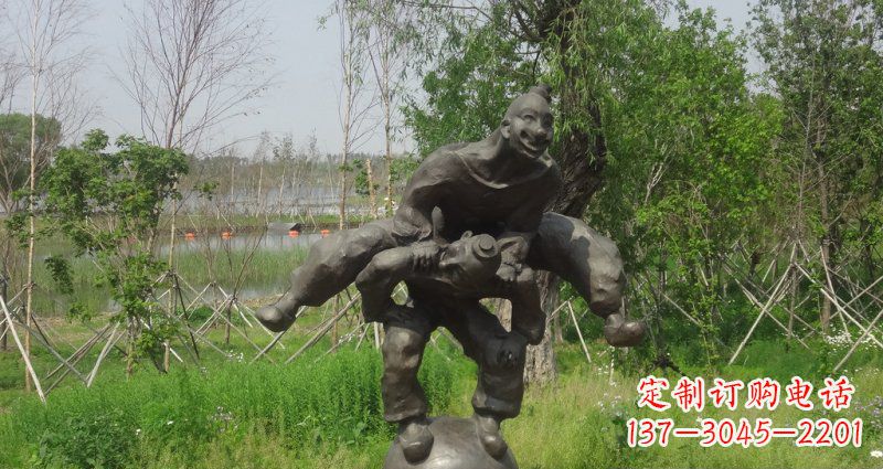 绵阳园林站在球上面跳山羊的人物景观铜雕