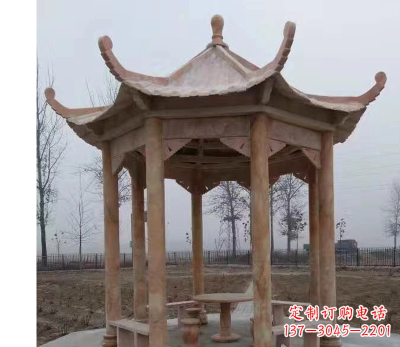 绵阳公园晚霞红八角石雕凉亭